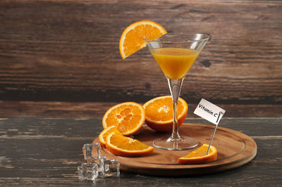 Close-up of orange fruit on table