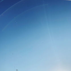 Full frame shot of water against clear blue sky