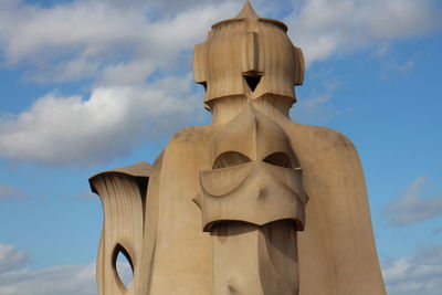 Low angle view of statue against sky