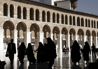 People walking at umayyad mosque