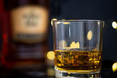 Close-up of beer glass on table