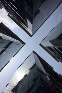 Low angle view of modern buildings against sky