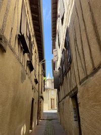 Narrow street amongst medieval houses in auch 