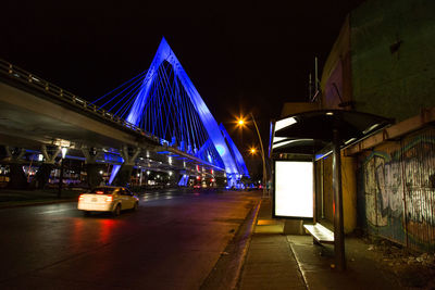 Illuminated street lights at night