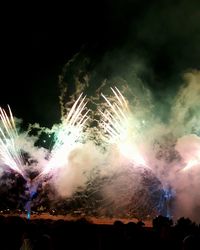 Firework display at night