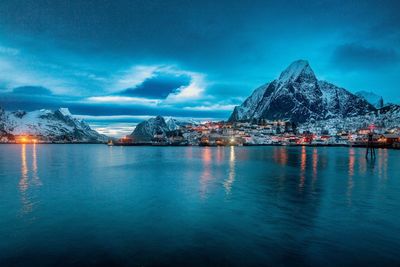 Scenic view of sea against sky in reine norway 