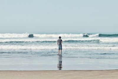 People standing on beach