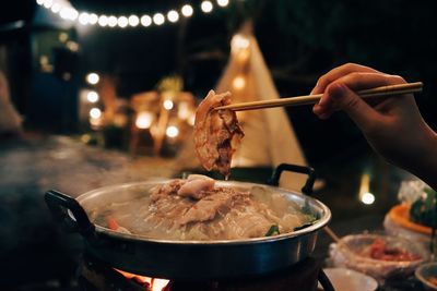 Close-up of person preparing food