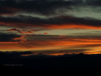 Scenic view of dramatic sky during sunset