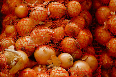 Full frame shot of onions for sale at market