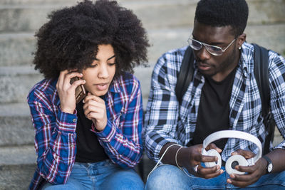 Young couple looking at camera