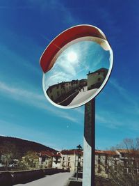 Buildings reflected in mirror