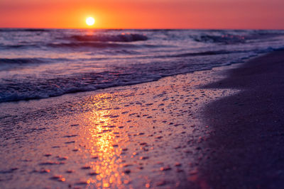 Scenic view of sea against sky during sunset