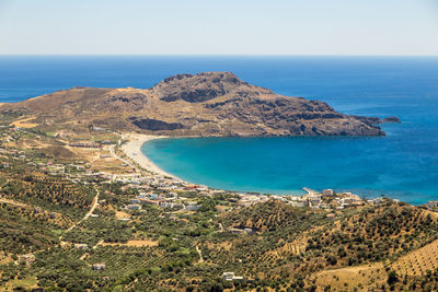 Scenic view of bay against clear sky