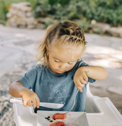 Cute girl holding ice cream