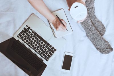 Woman using laptop on table