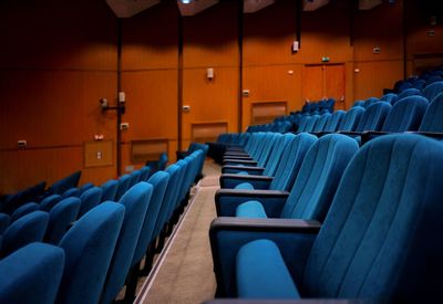 Empty chairs in auditorium