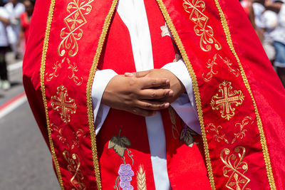 Priests are seen participating in the procession in tribute to santa luzia 