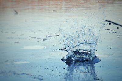 Close-up of drop on rippled water