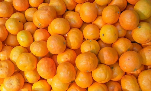 Full frame shot of oranges at market