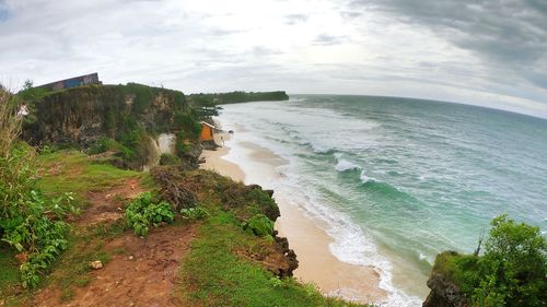Scenic view of beach against sky