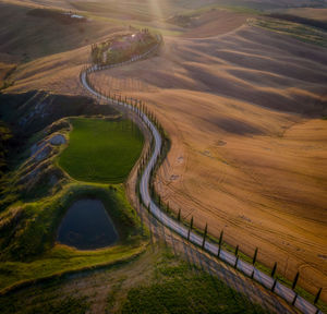 Aerial view of country road along landscape