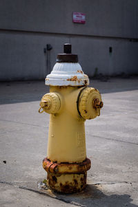 Close-up of fire hydrant on sidewalk