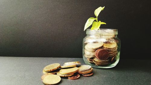 Close-up of coins on table