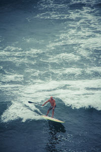 Man surfing in sea