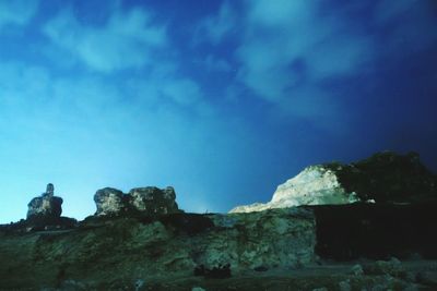 Rocks against blue sky