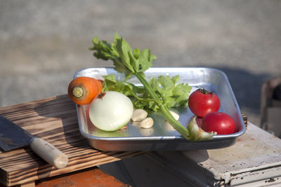 High angle view of various vegetables in tray on table