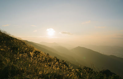 Scenic view of landscape against sky during sunset