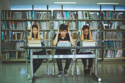 Group of people sitting on table