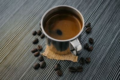 High angle view of coffee cup on table