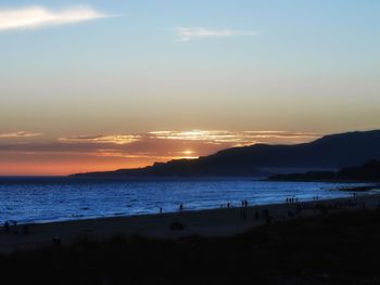 Scenic view of sunset over sea