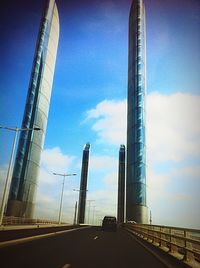 View of road against cloudy sky