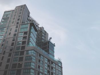 Low angle view of modern building against sky