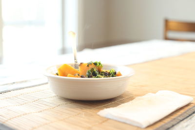 Close-up of salad in bowl on table