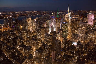 High angle view of illuminated cityscape at night