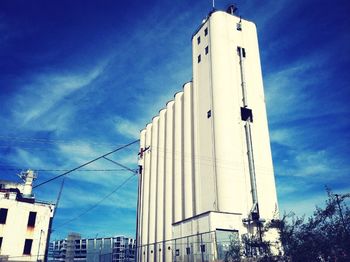 Low angle view of building against blue sky