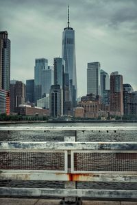 Modern buildings in city against sky