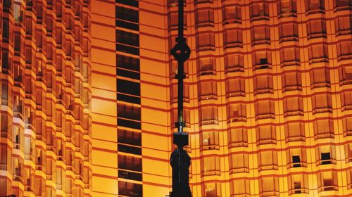 Low angle view of illuminated buildings at night