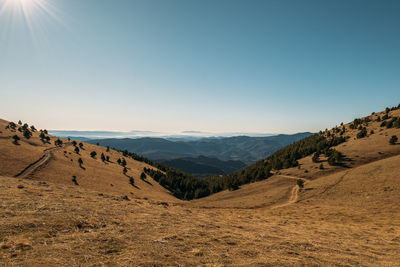 Scenic view of mountains against clear sky