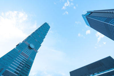 Low angle view of modern buildings against sky