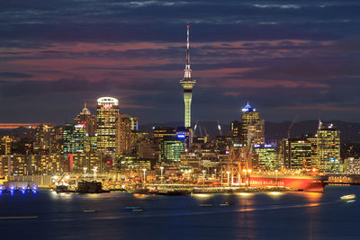 Illuminated buildings in city at night