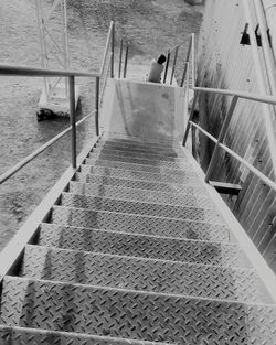 High angle view of people walking on steps