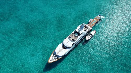 High angle view of sailboat sailing on sea