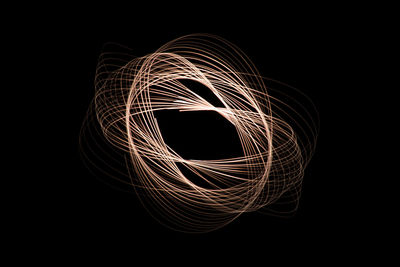 Light painting against black background