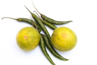 Close-up of fruits against white background