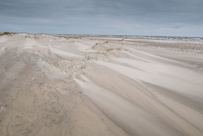 Scenic view of desert against sky